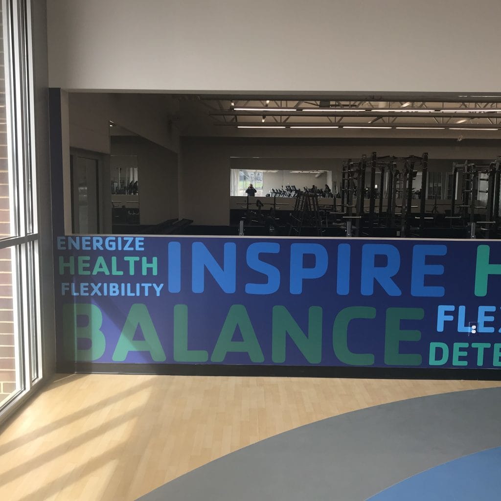YMCA gym wall banner with inspirational words