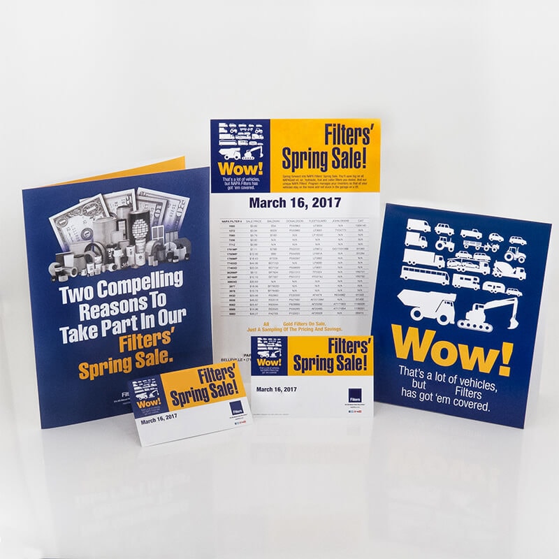 Branded promotional kit including a calendar, card, and more.